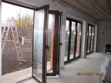 «Теплые» алюминиевые двери типа «гармошка» REYNAERS (Бельгия