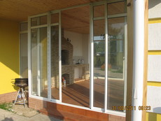 «Холодные» алюминиевые раздвижные двери ALUMIL (Греция)