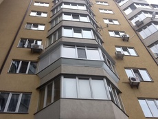 Работа по обшивке балконов