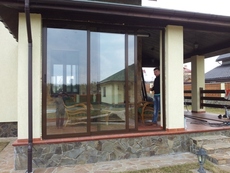 Остекление террасы раздвижными конструкциями