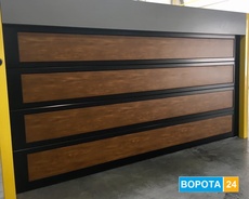 Автоматические секционные и роллетные гаражные ворота.