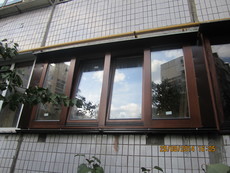 Остекление балконов деревянными окнами