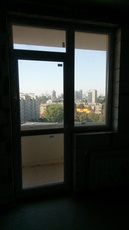 Продам пластиковое окно - выход на лоджию.