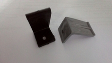 Фіксатор під підвіконня пластик